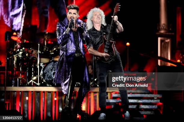 Adam Lambert performs alongside Brian May of Queen at ANZ Stadium on February 15, 2020 in Sydney, Australia.