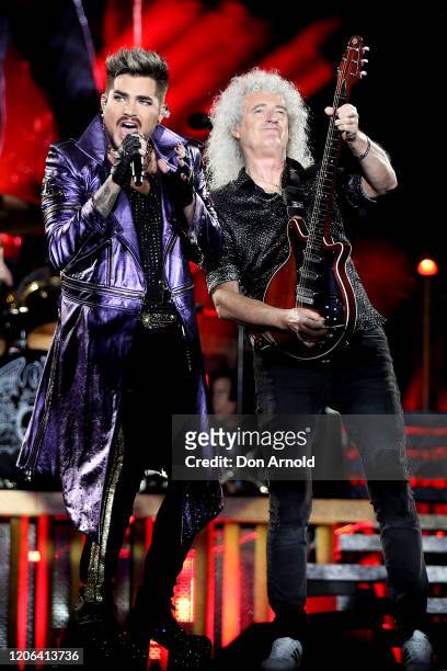 Adam Lambert performs alongside Brian May of Queen at ANZ Stadium on February 15, 2020 in Sydney, Australia.