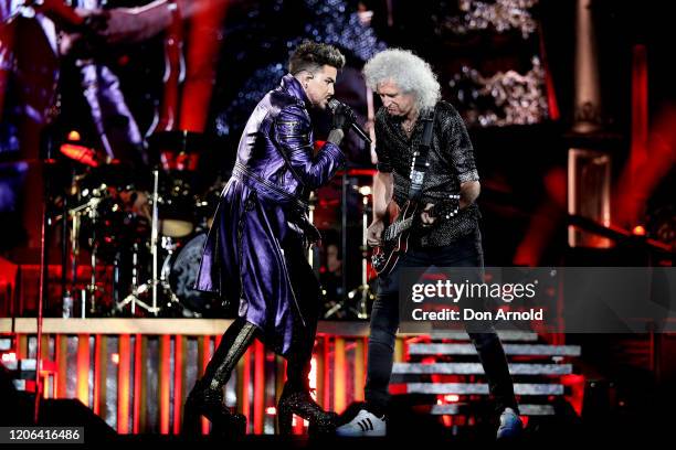 Adam Lambert performs alongside Brian May of Queen at ANZ Stadium on February 15, 2020 in Sydney, Australia.