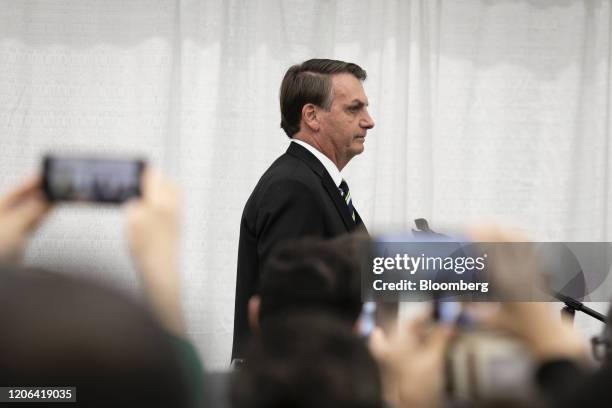 Jair Bolsonaro, Brazil's president, arrives for an event with supporters at the Miami Dade College Auditorium in Miami, Florida, U.S., on Monday,...