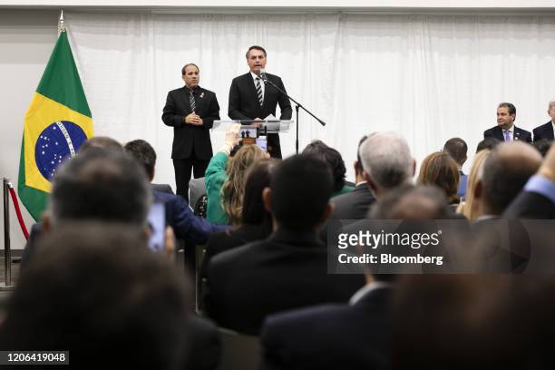 Jair Bolsonaro, Brazil's president, speaks during an event with supporters at the Miami Dade College Auditorium in Miami, Florida, U.S., on Monday,...