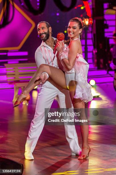 Lili Paul-Roncalli and Massimo Sinato looks on during the 2nd show of the 13th season of the television competition "Let's Dance" on March 6, 2020 in...