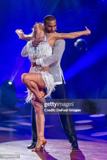 Kathrin Menzinger and Tijan Njie looks on during the 2nd show of the 13th season of the television competition "Let's Dance" on March 6, 2020 in...