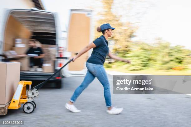 Delivery Rider Behind Lorry 531 Back Of Delivery Truck Stock Photos, High-Res Pictures, and Images ...