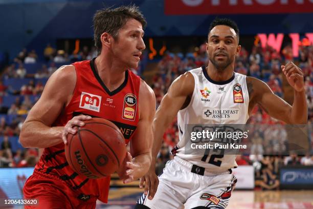 Damian Martin of the Wildcats looks to pass the ball during the round 20 NBL match between the Perth Wildcats and Adelaide 36ers at RAC Arena on...