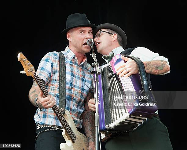 Nathen Maxwell and Matt Hensley of Flogging Molly perform during 2011 Lollapalooza at Grant Park on August 7, 2011 in Chicago, Illinois.