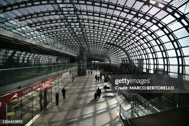 General view shows the Porta Susa railway station in Turin on March 10, 2020 as Italy imposed unprecedented national restrictions on its 60 million...