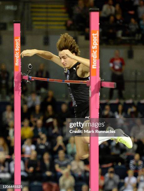 Armand Duplantis of Sweden breaks the world record in the Men's Pole Vault Final during the Muller Indoor Grand Prix World Athletics Tour event at...