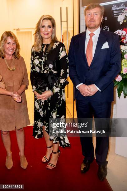 King Willem-Alexander of The Netherlands and Queen Maxima of The Netherlands during the meeting with the Dutch Society and the opening of the Photo...