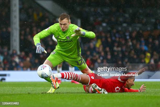 Jacob Brown of Barnsley is fouled by Marek Rodak of Fulham, leading to a penalty being awarded to Barnsley during the Sky Bet Championship match...