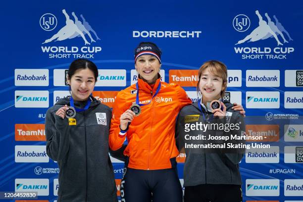 Ji Yoo Kim of Korea, Suzanne Schulting of Netherlands and Ah Rum Noh of Korea pose in the Ladies 1500m medal ceremony during day 1 of the ISU World...