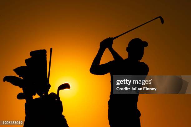 Maximillian Kieffer of Germany warms up on the driving range prior to his round during Day Two of the Abu Dhabi HSBC Championship at Abu Dhabi Golf...