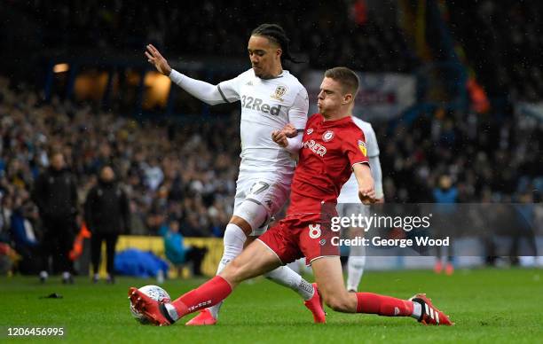 Helder Costa of Leeds United is challenged by Markus Henriksen of Bristol City during the Sky Bet Championship match between Leeds United and Bristol...