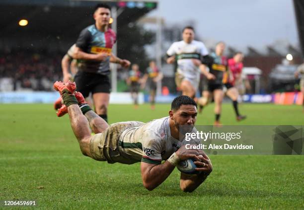 Curtis Rona of London Irish collects a charge down to score his sides third try during the Gallagher Premiership Rugby match between Harlequins and...