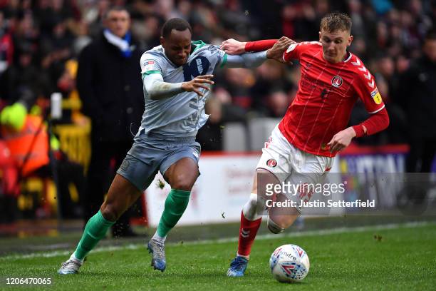 Ryan Nyambe of Blackburn Rovers battles for possession with Alfie Doughty of Charlton Athletic during the Sky Bet Championship match between Charlton...