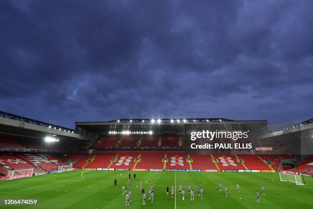 Atletico Madrid's players attend a training session at Anfield stadium in Liverpool, north west England on FMarch 10 on the eve of their UEFA...