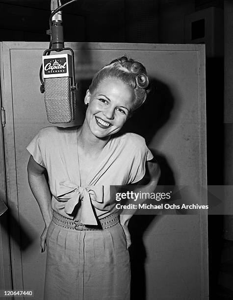 Jazz singer Peggy Lee records in the Capitol Records studios on April 10 1946 in Los Angeles, California.