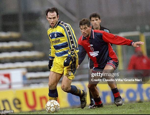 Alain Boghossian of Parma holds off Fabian O''Neill of Cagliari during the Serie A match at the Stadio Tardini in Parma, Italy. \ Mandatory Credit:...