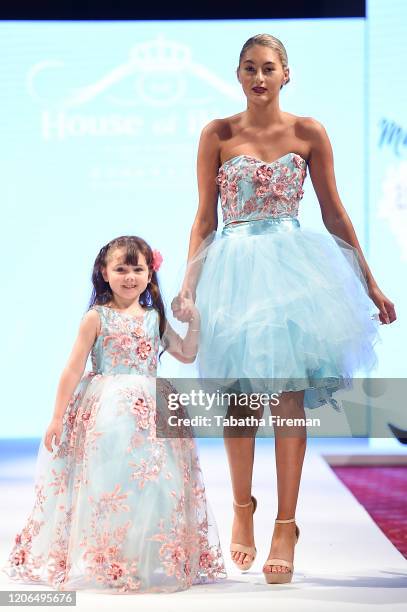 Model walks the runway for Marie Belle Couture at the House of iKons show at the Millennium Gloucester Hotel on February 15, 2020 in London, England.