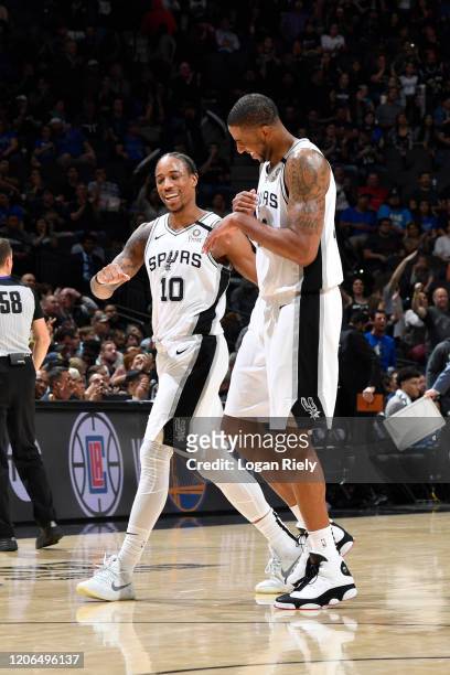 DeMar DeRozan of the San Antonio Spurs and LaMarcus Aldridge of the San Antonio Spurs shares a laugh during the game on March 10, 2020 at the AT&T...