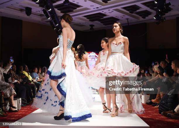 Model walks the runway for Marie Belle Couture at the House of iKons show at the Millennium Gloucester Hotel on February 15, 2020 in London, England.