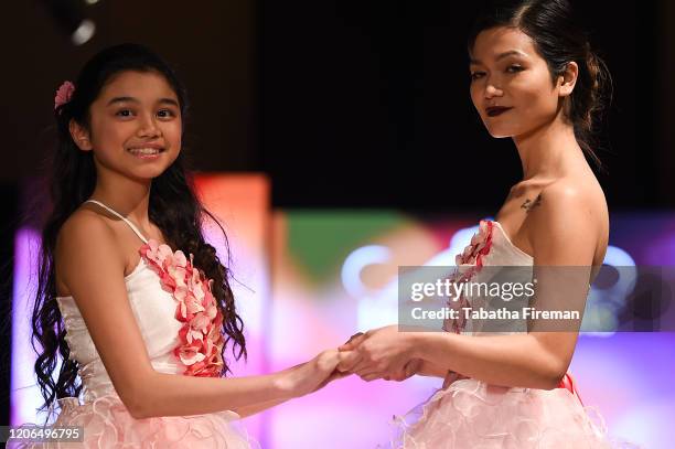 Model walks the runway for Marie Belle Couture at the House of iKons show at the Millennium Gloucester Hotel on February 15, 2020 in London, England.