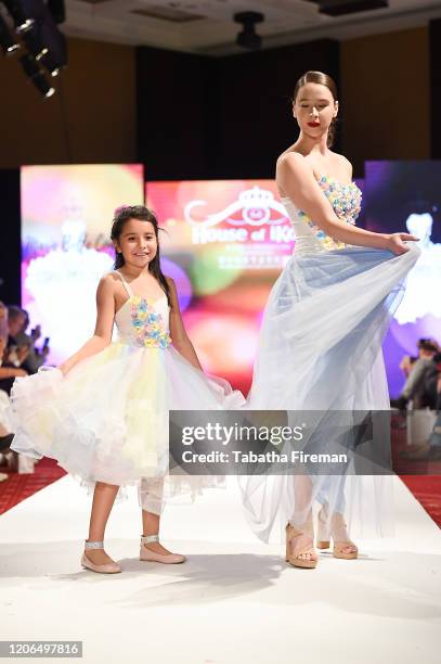 Model walks the runway for Marie Belle Couture at the House of iKons show at the Millennium Gloucester Hotel on February 15, 2020 in London, England.