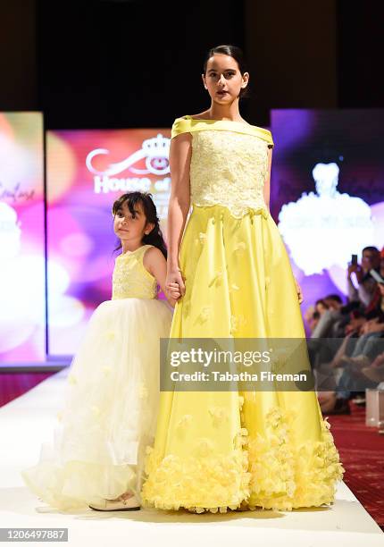 Model walks the runway for Marie Belle Couture at the House of iKons show at the Millennium Gloucester Hotel on February 15, 2020 in London, England.