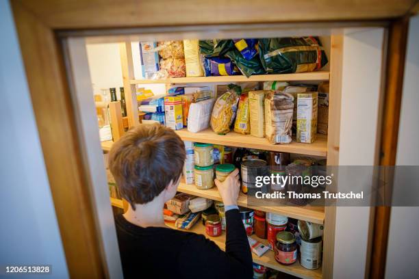 Symbol photo: A woman stands in front of a shelf with supplies of various foods on March 11, 2020 in Berlin, Germany. *** As part of the spread of...