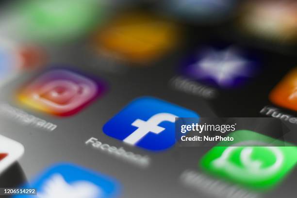 Facebook logo is seen displayed on smartphone in this illustration photo taken Krakow, Poland on March 10, 2020.