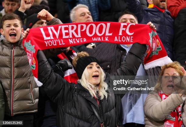 Fans of Liverpool during the Premier League match between Norwich City and Liverpool FC at Carrow Road on February 15, 2020 in Norwich, United...