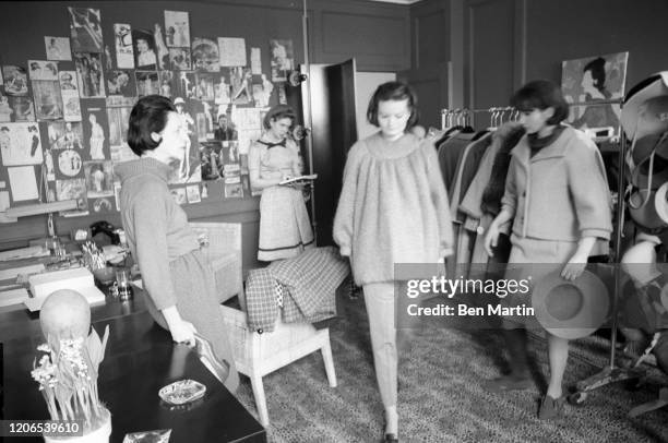 Diana Vreeland , Fashion Editor of Harper's Bazaar, selecting designs for an issue of the magazine, May 1, 1963.