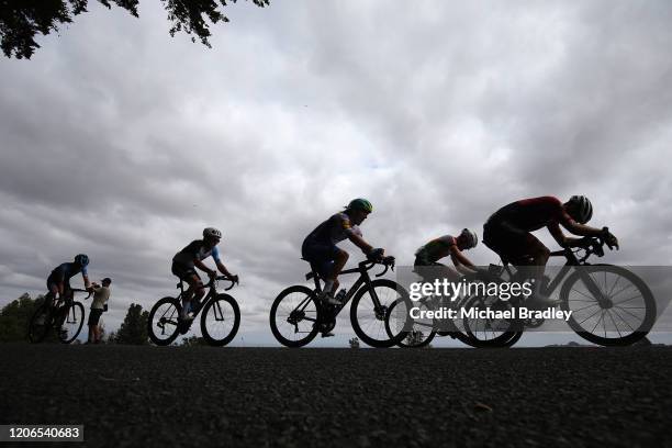 Shane Archbold and other riders reach the top of a climb during the New Zealand National Road Cycling Championships on February 16, 2020 in...