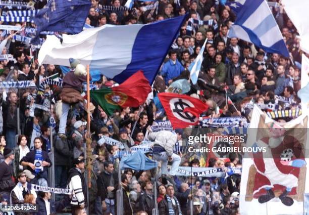 Lazio Rome's fans, with neo-nazi's flags, celebrate the entrance of their players, 21 November 1999, during the derby AS Roma-Lazio Roma at the...