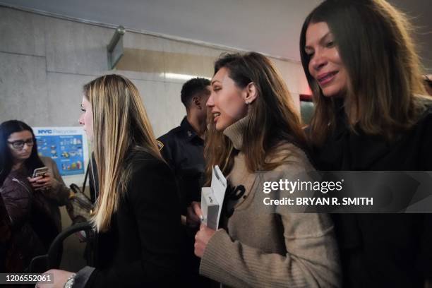 Jessica Mann and Dawn Dunning leave the courtroom following the sentencing of movie producer Harvey Weinstein at Manhattan Criminal Court on March...