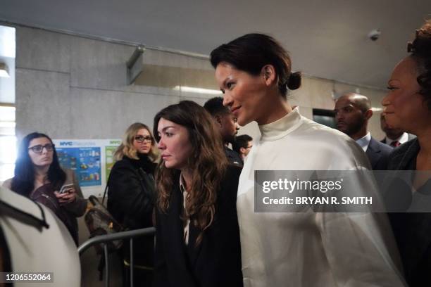 Miriam Hailey and Tarale Wulff leave the courtroom following the sentencing of movie producer Harvey Weinstein at Manhattan Criminal Court on March...