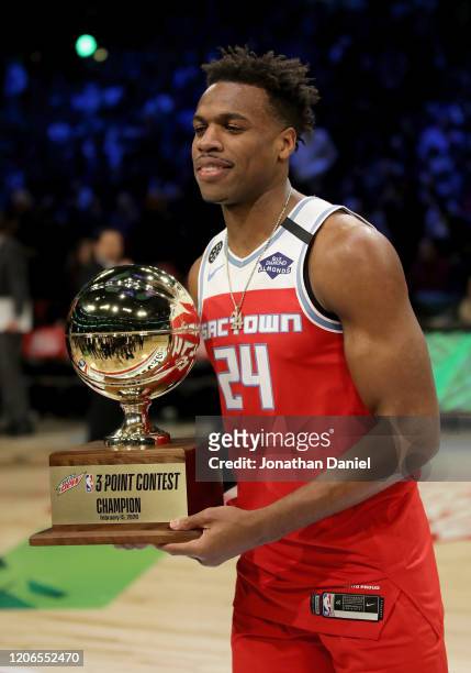 Buddy Hield of the Sacramento Kings celebrates with the trophy after winning the 2020 NBA All-Star - MTN DEW 3-Point Contest during State Farm...