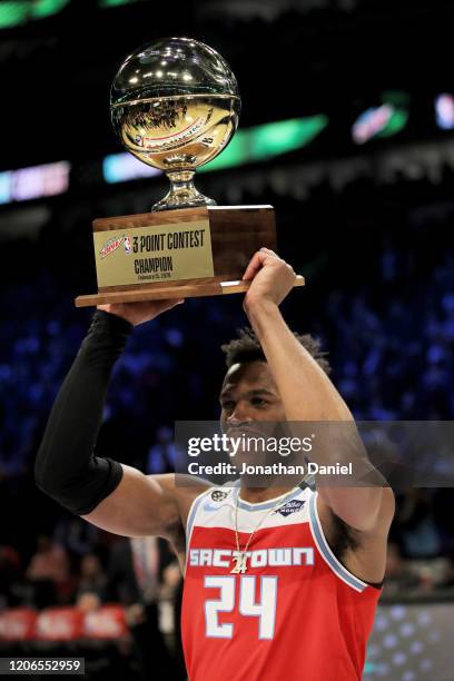 Buddy Hield of the Sacramento Kings celebrates with the trophy after winning the 2020 NBA All-Star - MTN DEW 3-Point Contest during State Farm...