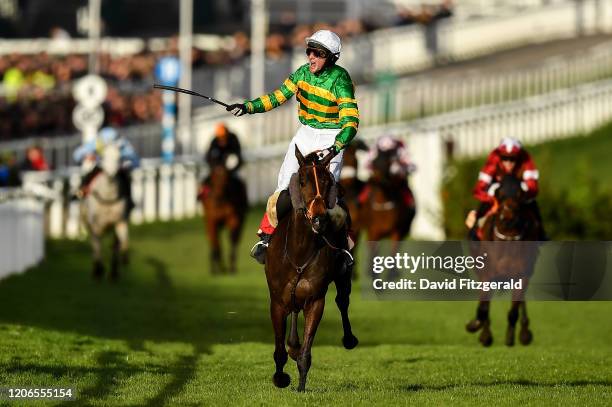 Cheltenham , United Kingdom - 11 March 2020; Jonathan Plouganou celebrates as he crosses the line to win the Glenfarclas Chase on Easyland during Day...