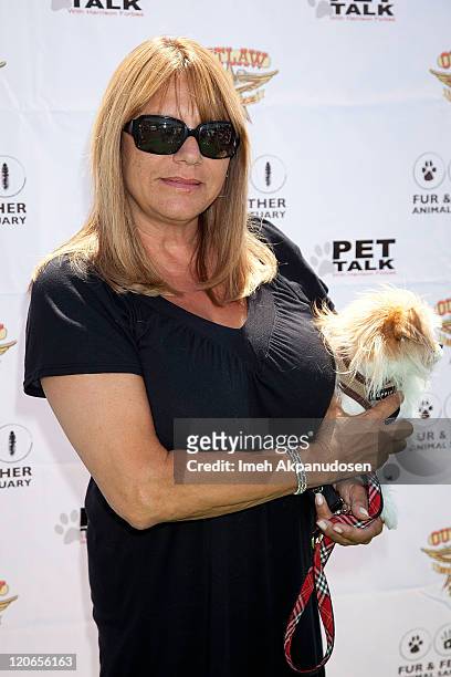 Gloria Butler attends the 1st Annual "Cuts 4 Critters" Celebrity Green Carpet & Pet Adoption on August 7, 2011 in Tarzana, California.