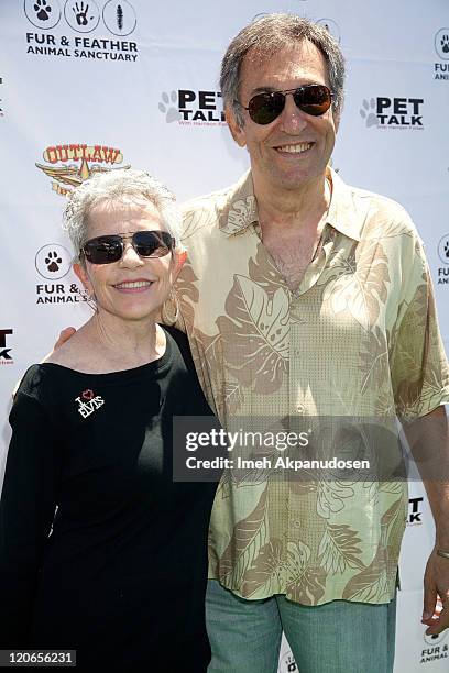 Larry Gellar and his wife attend the 1st Annual "Cuts 4 Critters" Celebrity Green Carpet & Pet Adoption on August 7, 2011 in Tarzana, California.