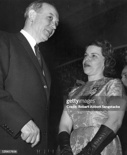 Secretary of State Dean Rusk speaks with attorney Marjorie Lawson at on of the formal balls held in honor of President Kennedy's inauguration,...