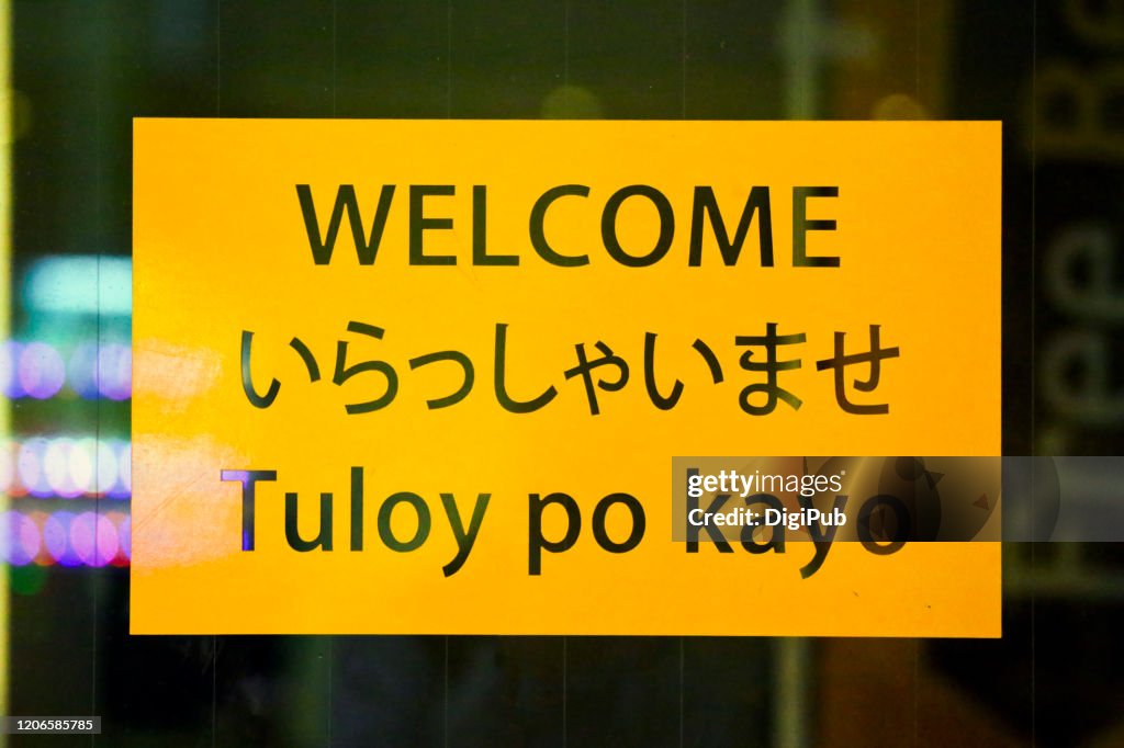 Trilingual welcome sign (English, Japanese, Filipino)