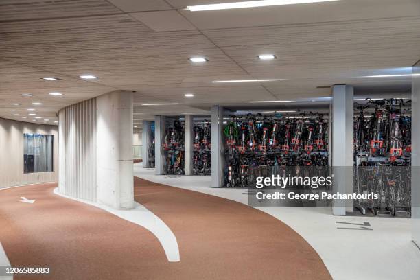 the world's largest bicycle parking garage in utrecht, the netherlands - utrecht stock pictures, royalty-free photos & images