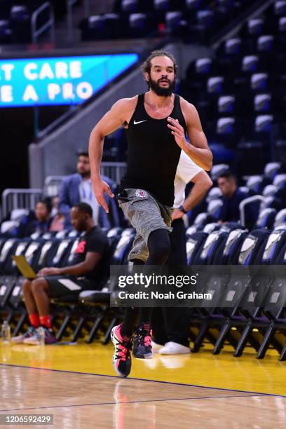 Joakim Noah of the LA Clippers warms up on the court before the game against the Golden State Warriors on March 10, 2020 at Chase Center in San...