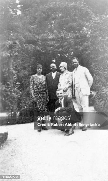 Portrait of American newspaper publisher Robert Sengstacke Abbott and his wife Helen Thornton Morrison , and Dahomian 'Prince' Kojo Tovalou Houenou...