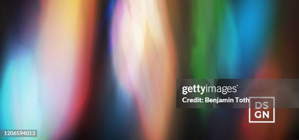 blurred neon light rays background - city street blurred stock illustrations