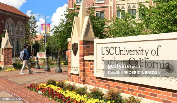 Student wears a facemask at the University of Southern California in Los Angeles, California on March 11 where a number of southern California...