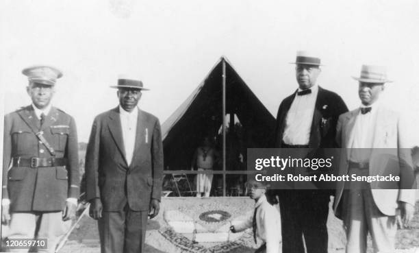 Portrait of, from left, American Lieutenant Colonel Otis B. Duncan , newspaper publisher Robert Sengstacke Abbott , politician Oscar de Priest , and...