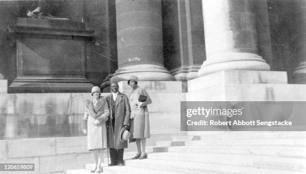 American newspaper publisher Robert Sengstacke Abbott poses with his wife Helen Thornton Morrison , and opera singer Roberta Dodd Crawford , Paris,...